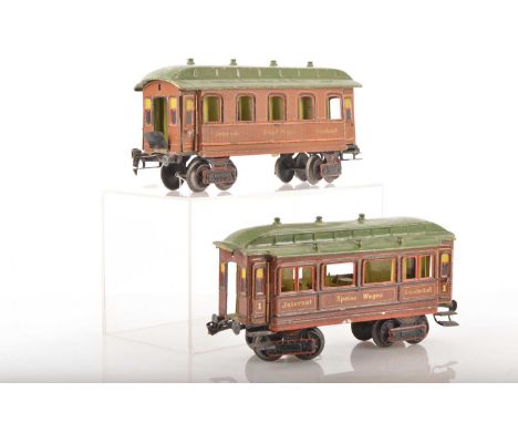 Marklin Gauge 1 Ref:1984/43 pair of 28cm 'Internat company' bogie passenger coaches (2) in brown with orange and black lining