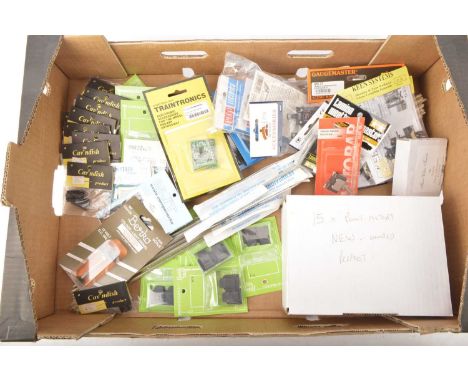 Large qty of 00 gauge Spares and Accessories including Electrical switches Point Motors Bogies Corridor Connectors and other 