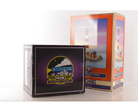 Modern Accessories for 0 Gauge by Lionel and MTH, a boxed 6-24135 Lionel Lighthouse, standing 18" high overall, fitted with l