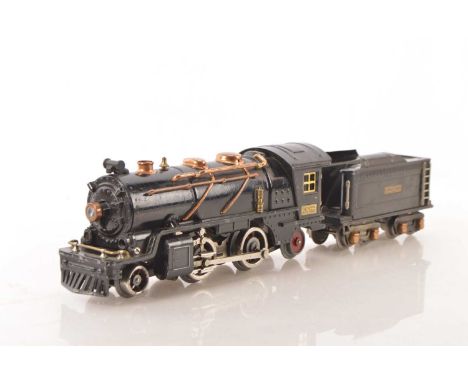 A Lionel 0 Gauge electric #262 Locomotive and Tender (2), appears to be the short-lived early version 2-4-2 of 1931-2, with m