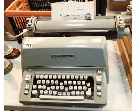 Hermes Ambassador typewriter with instruction manual. Not available for in-house P&amp;P, contact Paul O'Hea at Mailboxes on 