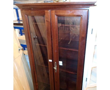 Large mahogany vintage type two glazed door four shelf bookcase with two lower drawers, H: 180 cm. Not available for in-house