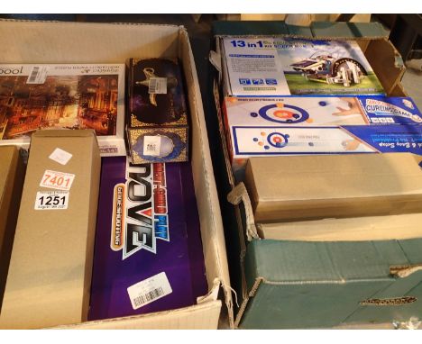 Two boxes of mixed new old stock games and toys to include Solar Robot, Carling games and puzzles. Not available for in-house