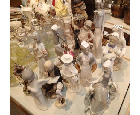 Large group of mixed figurines including Nao, Lladro and others. Not available for in-house P&amp;P, contact Paul O'Hea at Ma