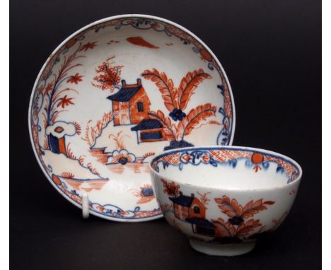 Lowestoft tea bowl & saucer circa 1785 decorated in Redgrave style with a version of the so called dolls house pattern of a C