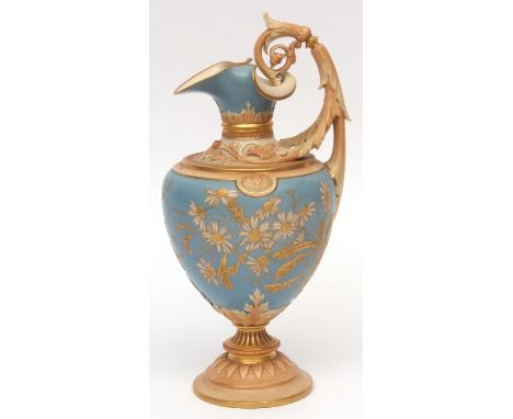 An impressive 19th century Worcester ewer of baluster shape with scroll handle, the pale blue ground with raised floral decor