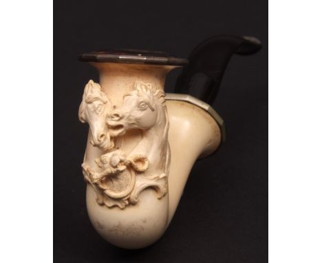 Late 19th/early 20th century Meerschaum pipe, the shaped bowl carved with two horses heads over a hound carrying a riding cro