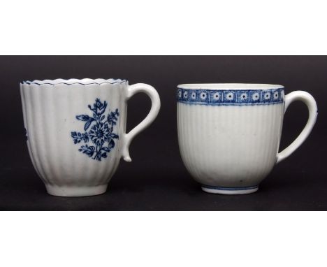 Two Lowestoft coffee cups circa 1780, the first of reeded shape with scalloped rim decorated with a blue printed design of fl