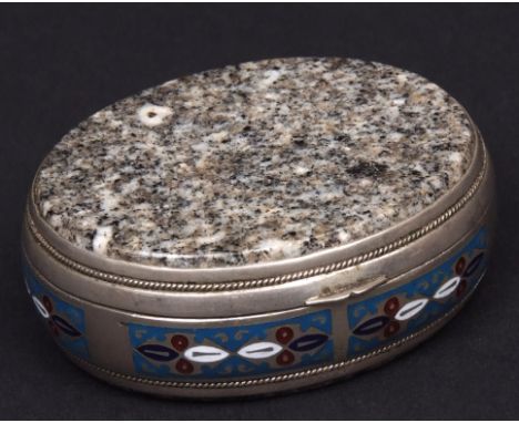 Unusual enamel and hard stone set snuff box of oval form, the hinged and polished cover and base inset with grey granite pane