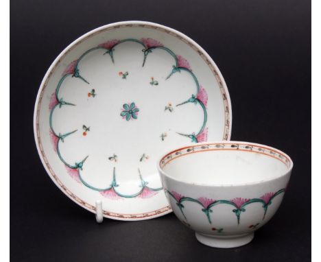 Lowestoft tea bowl & saucer circa 1790 with enamelled decoration of looped arches and flower sprigs with flowerhead to centre