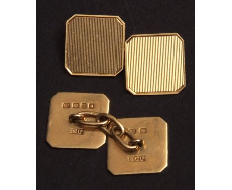 Pair of 18ct gold gent s cuff links, square shaped with canted corners, engine turned decoration with chain connectors, hallm