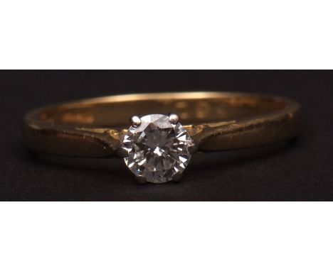 Late 20th century 18ct gold and diamond solitaire ring, the round brilliant cut diamond (0.35ct app) claw set with tapering p