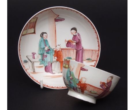 Lowestoft tea bowl & saucer circa 1780 decorated with a Mandarin type pattern of Chinese figures outside a building within a 