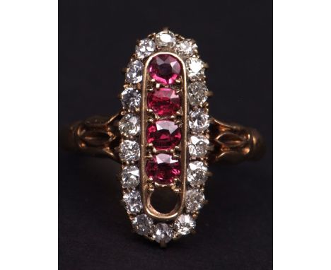 Antique ruby and diamond dress ring, the oval panel line set with four (of five) circular cut rubies, within a single cut dia