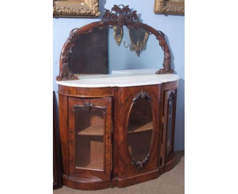 Victorian burr walnut credenza of break fronted  D  design, having a demi-lune mirror over with carved grapevine detail, abov