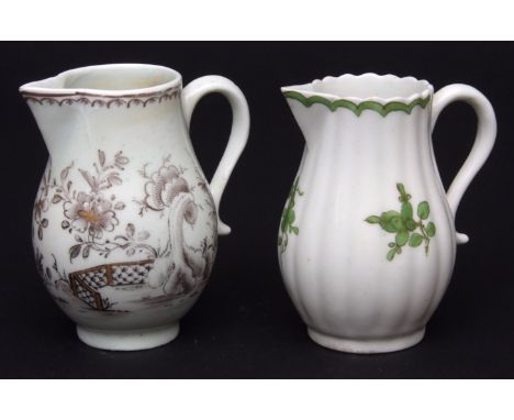 Two Lowestoft sparrow beak jugs circa 1790 the first decorated with a Chinese garden scene in black and gilt beneath a line, 