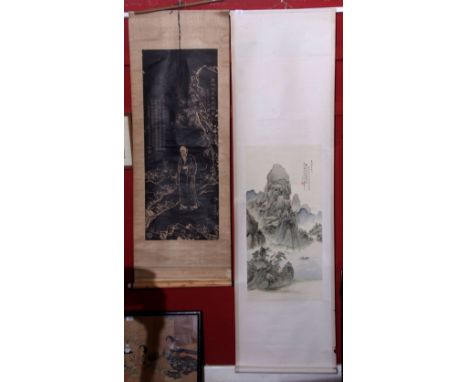 Two Chinese hanging scroll paintings, the first depicting a scholar in a garden setting in black ink, approx 57ins, the secon