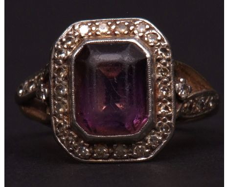 Mid-20th century 18ct gold amethyst and diamond ring, the rectangular shaped facetted amethyst (8 x 6mm approx) within a smal