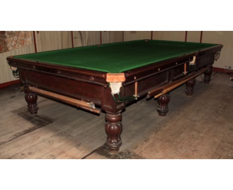 Full size mahogany framed snooker table, green baize inset, raised on 8 fluted and waisted ring turned supports with heavy pe