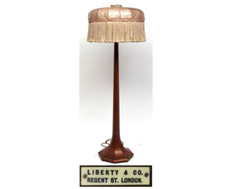 Liberty & Co Art Deco period walnut standard lamp and shade on trumpet formed octagonal sloping base, tapering octagonal colu