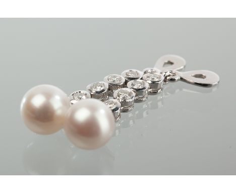 PAIR OF CULTURED PEARL AND DIAMOND DROP EARRINGS
each set with a pearl drop of approximately 8.5mm diameter, below a row of f