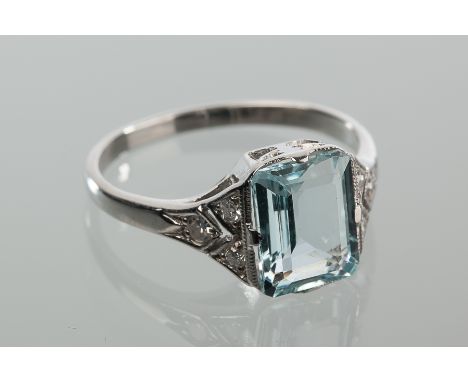 AQUAMARINE AND DIAMOND RING
the central emerald cut aquamarine approximately 1.72 carats, flanked by brilliant cut diamonds, 