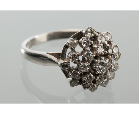 DIAMOND CLUSTER RING
with a graduated, stepped cluster of brilliant cut diamonds, unmarked, size M