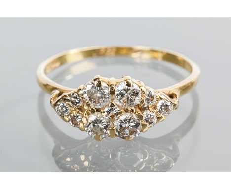 DIAMOND CLUSTER RING
set with brilliant cut diamonds totalling approximately 0.82 carats, in eighteen carat gold, size N-O