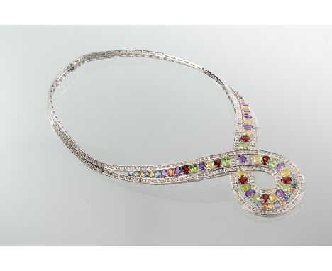 IMPRESSIVE MULTI GEM AND DIAMOND SET NECKLACE
of loop design, set with alternating oval gems of various colours, bordered by 