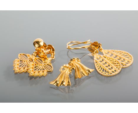 THREE PAIRS OF EASTERN GOLD EARRINGS
each with pierced decoration, 12g gross