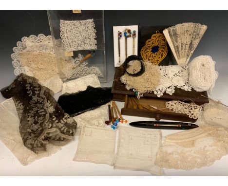 Victorian and later Lace and Lace Bobbins; a Honiton, Devon lace cuff, and a Bedfordshire Pillow lace, with bobbin, in a muse