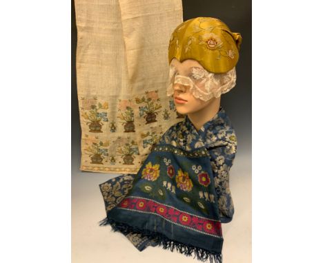 A Swedish embroidered silk bonnet, c. 1910-1920; an early 20th century scarf with silk fringe, possibly Spitalfields; a late 