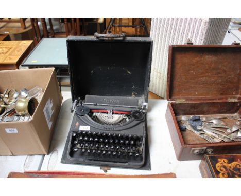 An Oliver portable typewriter in carrying case