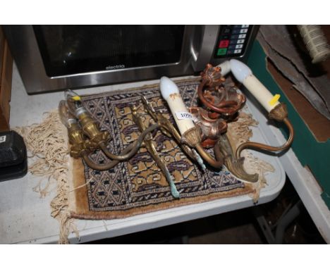 A quantity of light fittings and small Eastern rug