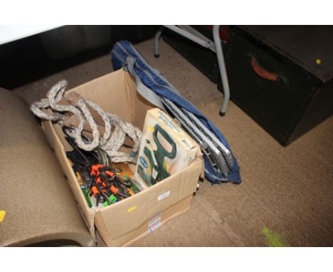 A box containing as new work gloves, cables, rope ladder etc. 