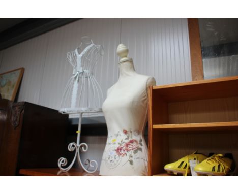 A tailors mannequin torso with a wire worked mannequin
