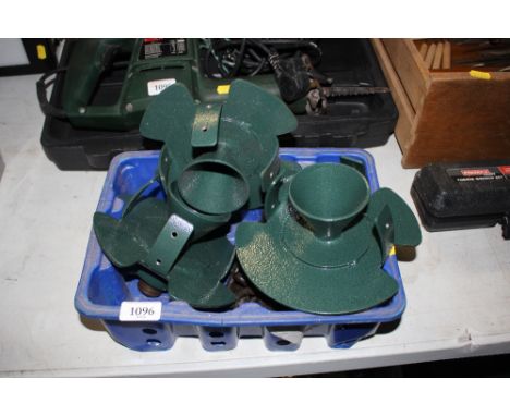 A box containing tail gate chains and three metal fittings