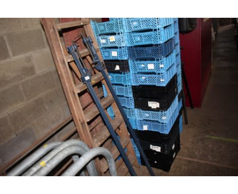 A pair of metal sash clamps