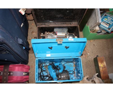Two tool boxes and contents of jig saws, electric drill, inspection lamp etc. 