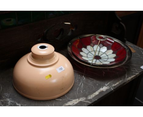 A Tiffany style light shade and a metal light shade