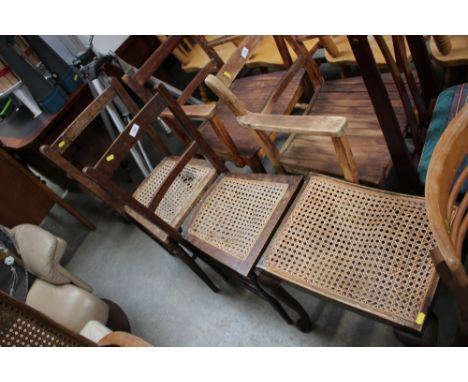 A pair of bar back and cane seated chairs; and a cane seated stool