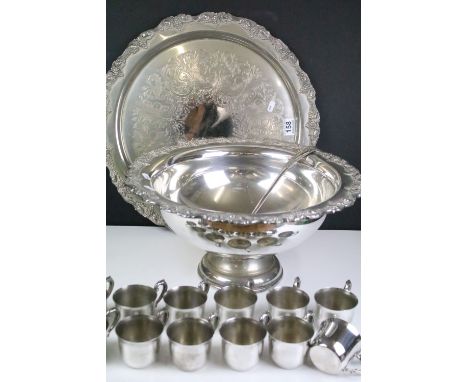 Large footed punch bowl with ladle and punch cups, large platter. All with moulded grape vine rims. Punch bowl measures 45cm 