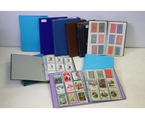 Ten albums of playing card jokers all displayed in plastic wallets. Most around mid 20th Century in age. 