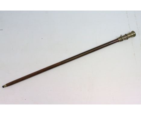 Wooden walking cane with brass compass to the lid, approx 96.5cm long 