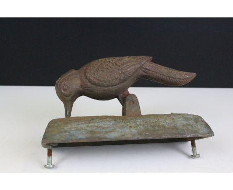 Cast iron door knocker in the form of a woodpecker 