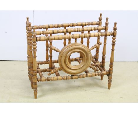 Bobbin turned two section magazine rack with circular nautical, ship's wheel shaped design, 38cm high x 43cm wide x 21.5cm de