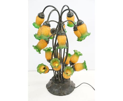 Art Nouveau style eighteen-light lamp with amber &amp; green mottled glass shades, raised on a bronze effect resin base, appr