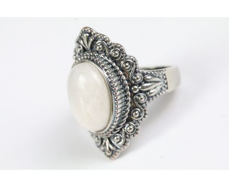 A ladies silver and moonstone ring, marked 925 to the shank. 