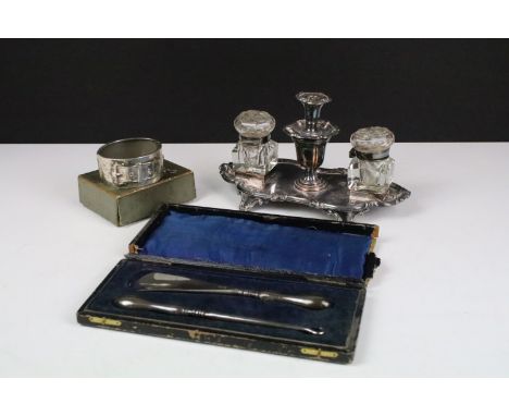 A silver plate and cut glass standish together a cased silver handled shoe horn and button hook set and a hallmarked silver b