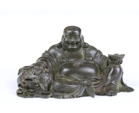 A Chinese bronze ornamental buddha figure, approx 10cm in length 